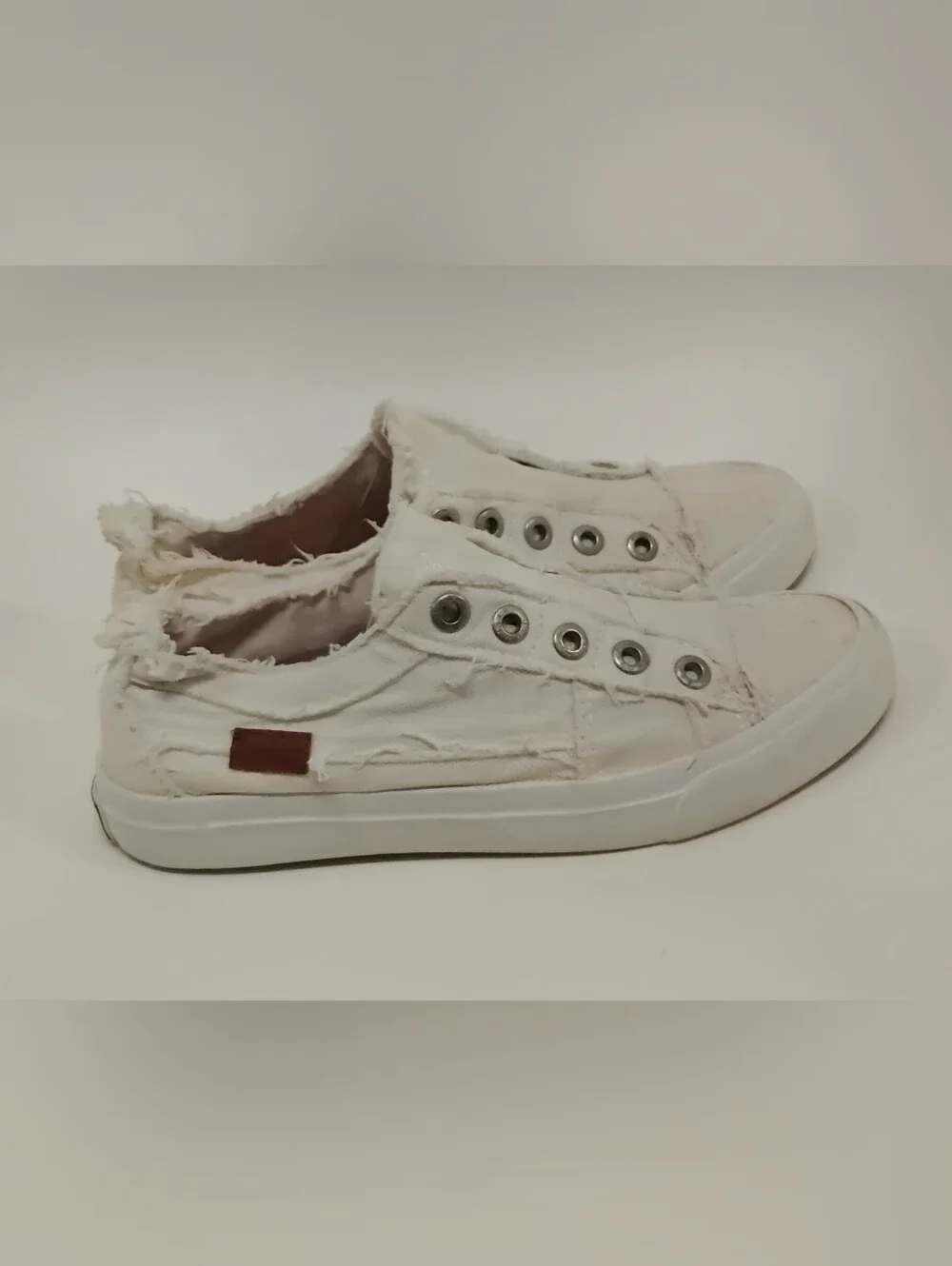 Women's White Canvas Slip-On Sneakers with Frayed Trim